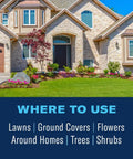 Stone house with landscaped lawn, trees, and flowers, illustrating use of Ready To Spray Outdoor Insect Killer for pest control.