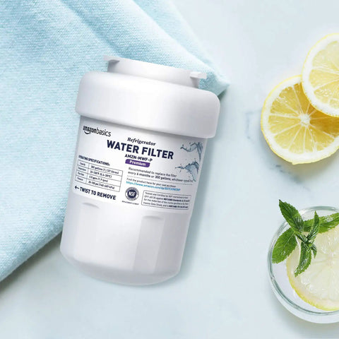 GE MWF Refrigerator Water Filter Cartridge With Dope Filtration And Advanced Filtration on blue towel next to lemon slices