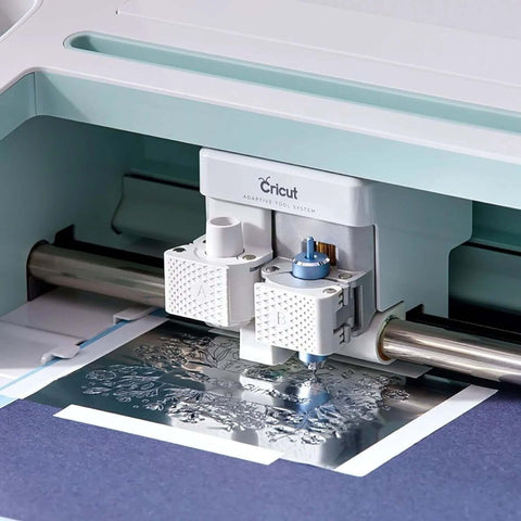 Cricut Foil Transfer Kit installed on Cricut Maker/Explore; white tool housing with 3 interchangeable tips.