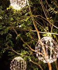 Three Pack 16 Inch LED Globe Light Balls For Indoor Outdoor Use With Fold Flat Metal Frame Waterproof And Lightweight Warm White Lights Perfect For Holiday Decor Patio Parties Weddings And Event Ambience hanging in trees