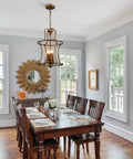 Dining room with Modern Lantern Pendant Light With Four Lights In A Rusty Gold Finish, adjustable height ceiling fixture