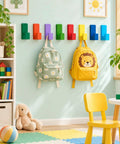 Fresh Rainbow Wooden L Shaped Wall Hooks Eight Pack With Adhesive Pads And Screws Vibrant Multicolor Storage Rack For Kitchen Or Entryway Pretty Sweet Finish Totally Rad Quality, displaying colorful hooks holding kids' backpacks in a playful room.