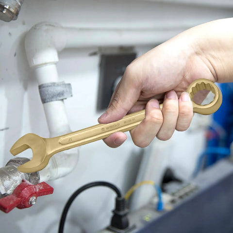 Must-Have Non-Sparking Tool Set 11-Piece Aluminum Bronze Kit in use with combination wrench 23mm to 32mm on pipe