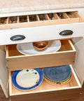 Premium Two Tier Pull Out Cabinet Organizer Featuring Ball Bearings And Smooth Glide Slide Out Drawer For No Sweat Assembly Tons Of Room Under Counter Kitchen Pantry Storage Solution Fits 17 Wide with cutlery and plates.
