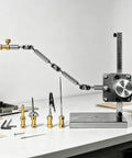 Stop Motion Armature Stand With Flexible Multi Joint Arm Height Adjustable Metal Bracket For Smooth Shots And Precise Angles Vertical Rack Design To Dial In Any Studio Setup Easily, metal arm extended on table