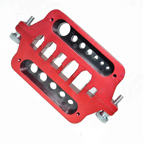 Slick Aluminum Soldering Station And Welding Jig Plate For Rc Builders No Sweat Assembly With Xt60 Xt90 T Plug Banana Connectors Heat Proof Workbench Setup, red aluminum design with multiple holes for connectors.