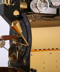 Close-up of a Commercial Drum Coffee Roaster Machine with Digital Temperature Control and Rapid Cooling System for cafe use.