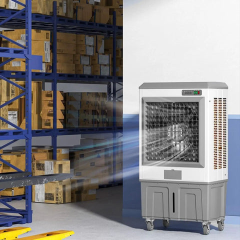 Heavy Duty Evaporative Air Cooler And Industrial Swamp Unit With Massive Water Tank Dual Oscillating Fans in a warehouse setting.