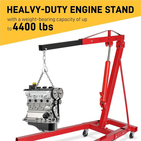 Badass 2 Ton Hydraulic Engine Hoist 4000 Lb Capacity Folding Cherry Picker lifting an engine with chain, heavy duty red steel frame.