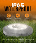 Outdoor Solar Lights For Garden And Pathway With 8 LED IP65 Waterproof Landscape Lighting in rain demonstrating durability.