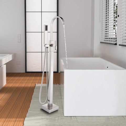 Pro Grade Floor Mount Tub Filler Freestanding Bathtub Faucet With Brushed Nickel Finish next to modern white tub in stylish bathroom