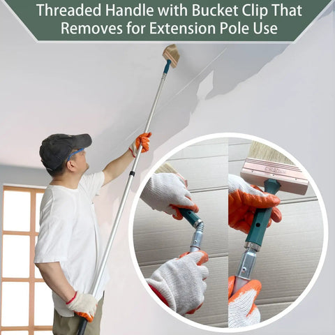 Man using Pro Grade Deck Stain Brush Set with threaded extension pole for painting high walls, showcasing handle and brush detail.