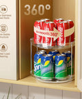 2 Tier Lazy Susan Turntable Organizer For Narrow Cabinets holding soda cans in clear two-tier structure, demonstrating 360° rotation