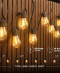 200 Ft LED Outdoor String Lights With Shatterproof Edison Bulbs on wooden fence, displaying sockets and wires in night setting.