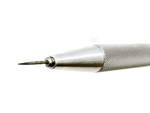Close-up of Slick Retractable Awl And Air Release Needle No Fuss Carbon Steel Scribe with fine tip, ideal for vinyl weeding.