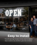 40 Inch By 14 Inch LED Open Sign With Remote Control displayed in store window showing high visibility, attracting passersby.