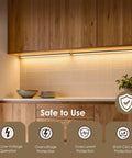 Kitchen with Six Piece Slat Wall Light Kit For Wood Panels With Adhesive Black LED Strips installed under cabinets, warm lighting