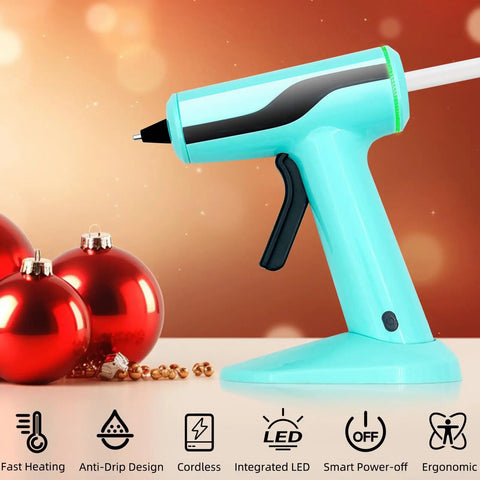 Cordless Hot Glue Gun Kit With Rechargeable Built In Battery Smart Auto Off 2Ah, Mini Glue Gun next to red holiday ornaments