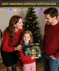5 In 1 STEM Robot Kit For Kids Ages 8 To 16 With App And Remote Control held by smiling family in front of Christmas tree