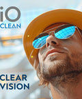 iO CLEAN eyeglass lens cleaner kit logo visible; man wearing yellow hat and mirrored blue sunglasses