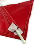Close-up of red dive flag for scuba and spearfishing with float or buoy and pole, 14 by 16 inch, showing removable fiberglass stiffener.