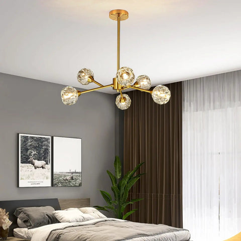 Gold Sputnik Crystal Chandelier, 6 Light Modern Dining Room Fixture Over Table in a bedroom setting
