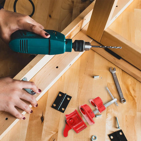 Three Quarter Inch Pipe Clamp With Quick Release Cast Iron Construction For Woodworking And Carpentry in use during DIY project.