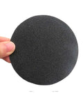 Grab These 30 Pcs 4 Inch Silicon Carbide Sanding Discs With Hook And Loop Back For Smooth Polishing And Heavy Duty Prep Jobs Across All Grit Levels From Rough To Razor Sharp Finish, showing a single 4 inch disc held by a hand.