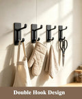 Heavy Duty Self Adhesive Hooks Matte Black Pack Of 3 Rust Proof Stainless Steel No Drill Wall Mount with cooking towels.