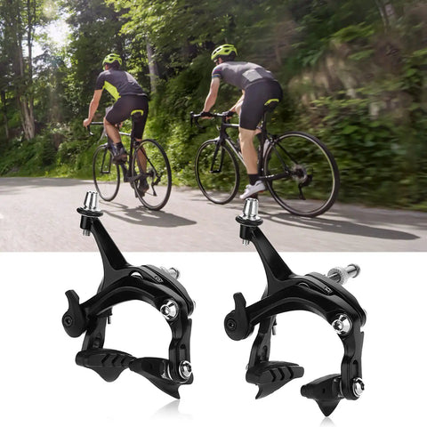 Deadly Smooth Road Bike V Brake Set Featuring Heavy Duty Mechanical Dual Pivot Calipers With Tough Aluminum Alloy Housing For Grip Tight Front And Rear Wheel Control In Sleek Black mounted near cyclists riding on a road.