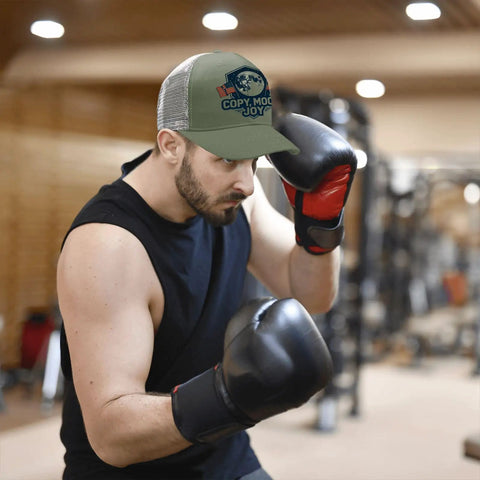 Man boxing in gym wearing Full Moon USA Flag Statement Hat For Men Trucker Cap Army Green Dope Cool Breathable Baseball Cap