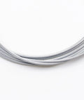 Universal Throttle Cable Repair Kit for Lawn Mower Control, close-up of durable flexible steel wire, adjustable Z bend cable end.