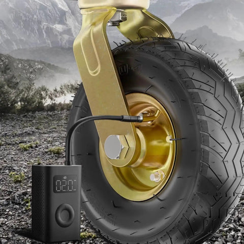 Badass 10 Inch Rubber Caster Wheels Set Of 4 With Upgraded Ball Bearings and Thick Steel Plates mounted on a rugged terrain.