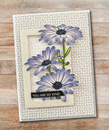 Card featuring Cute Chamomile Silicone Clear Stamp And Die Set for Card Making, showing blue chamomile flowers on a polka dot background.