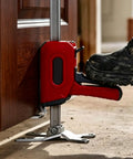 Heavy Duty Arm Jack 2 Pack, Zero Sweat Furniture Lifter, 330 Lbs Hand Lift Tool in use to lift a door, with a foot on the lever.