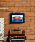 Blue metal wall-mount first aid kit with 200-piece contents on brick wall