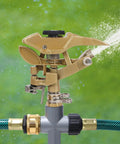 Close-up of Two Pack Impact Sprinklers with Metal Step Spikes, Heavy Duty Zinc Alloy Lawn Sprinkler Heads On Spike Bases in action