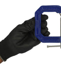 Hand holding Super Handy Quick Grip C Clamp Two And A Half Inch Opening And Two And A Half Inch Throat Depth Smooth Rolled Threads For Fast Secure Hold On Woodworking And Metalworking Projects blue steel