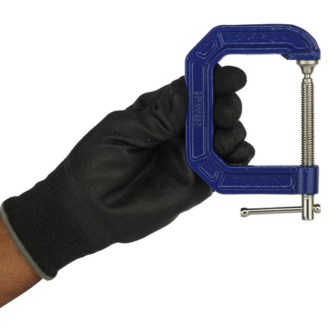 Hand holding Super Handy Quick Grip C Clamp Two And A Half Inch Opening And Two And A Half Inch Throat Depth Smooth Rolled Threads For Fast Secure Hold On Woodworking And Metalworking Projects blue steel