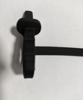 Keep Your Rig Running Smooth With This Hella Reliable EV Charger Plug Port Cover featuring a quick zip tie mount in black rubber.