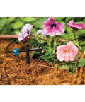 Low Flow 0.5 GPH Button Dripper Emitter for Drip Irrigation, 25 Pack in use watering flowers, self-piercing design