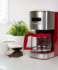 Red 12 Cup Programmable Drip Coffee Maker With Auto Shut Off And Glass Carafe, Regular Or Bold Brews, on kitchen counter