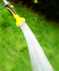 Fan Spray Nozzle For Garden Hose With Flow Control And Ergonomic Insulated Grip Built Tough Heavy Duty Hose Head Sprayer in use