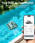 Cordless Robotic Pool Cleaner in operation with smartphone app interface displayed, showcasing cleaning technology for inground and above-ground pools.