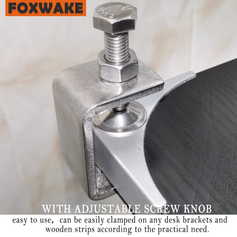 Close-up of a Foxwake stainless steel mini desk clamp with 1-inch jaw opening, adjustable screw knob, protective pad.