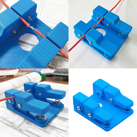 Super Cool Qinkyh Welding Wire Fixture And Soldering Table Clamp That Lets You Handle Any Diameter From 0.3 To 8mm With Ease on a desk.