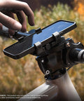 Bike Phone Holder For 4.0 To 6.9 Inch Phones And Garmin GPS Mount attached to handlebars with elastic straps