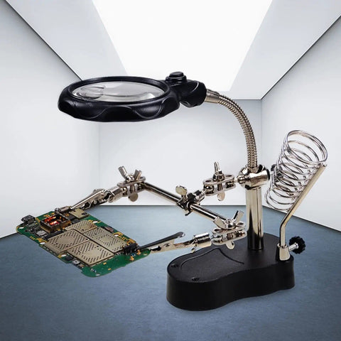 4X LED Magnifier Soldering Station with light, adjustable stand and auxiliary clips holding a circuit board for repair.