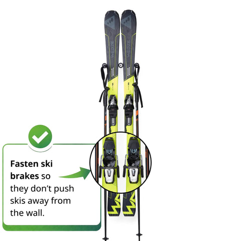Super Sleek Ski Wall Mount Rack Keeps Your Skis Tight And Scratch Free With Hybrid Edge Guard Tech holds skis at the wall with brakes fastened.