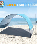 Beach Tent Sun Shelter Canopy With UPF 50 Protection, Comes With 8 Wind Ropes And 12 Ground Stakes, light blue at beach.